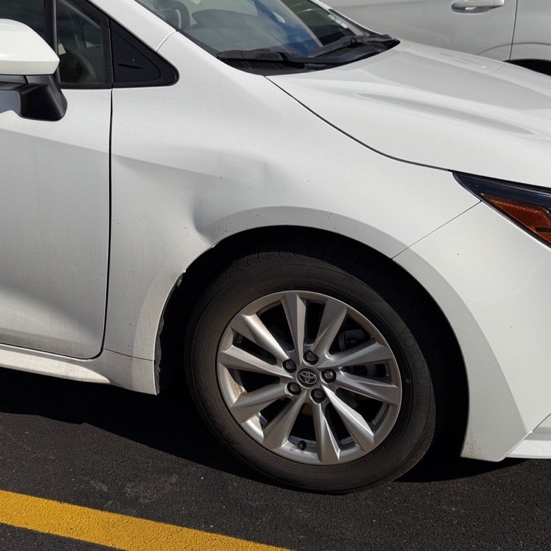 Before: Front Fender Dent